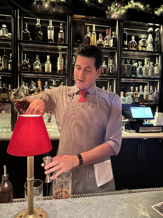 Bartender making craft cocktails at Pascal and Sabine in Asbury Park New Jersey