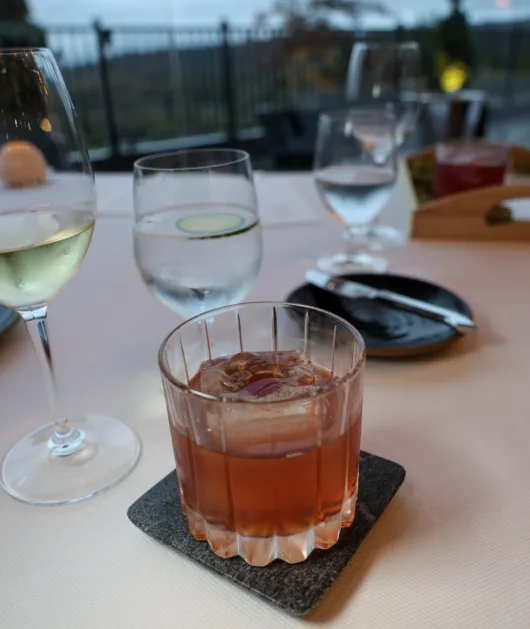 Nor’easter cocktail served over a large ice cube at Restaurant Latour.