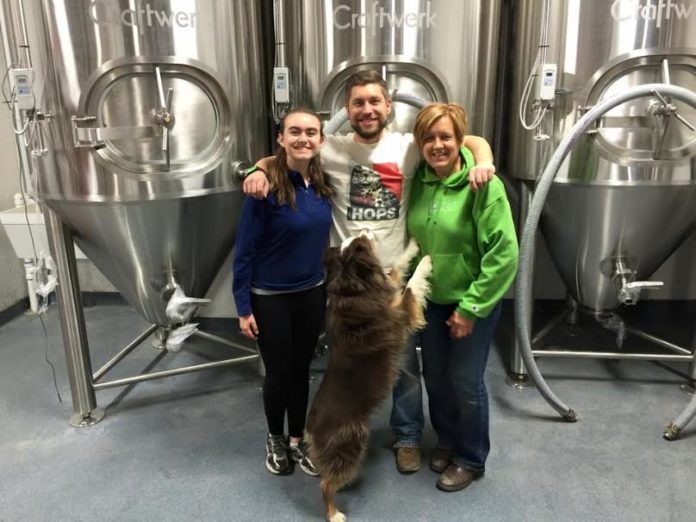 Departed Soles Family It's Bring Your Family to Work Day at Departed Soles. Brian with his mother, cousin Molly and his dog Bogan.