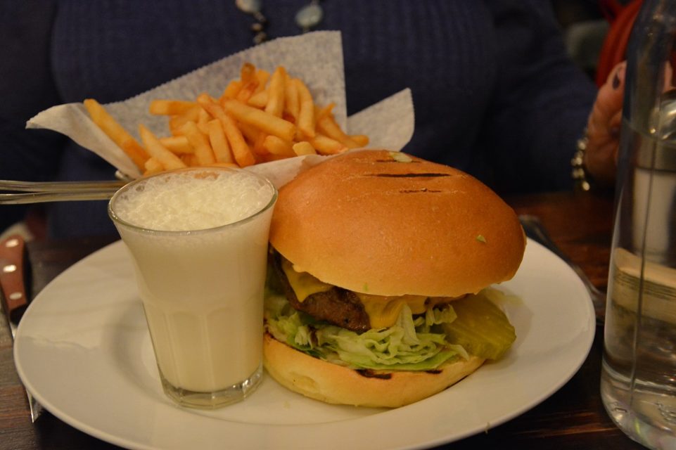 Burger with a cute vanilla milkshake