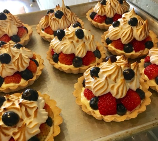 Fresh fruit tarts with vanilla pastry cream and meringue topping at Plum Bakery, Jersey Bites