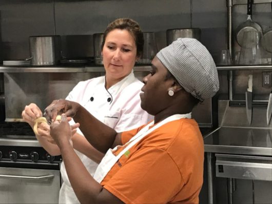 Chef Lisa with a student at Fulfill