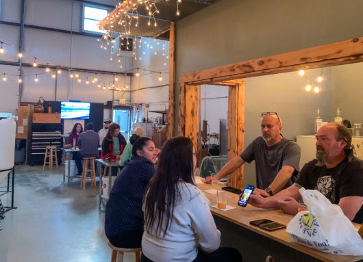 patrons at Skunktown Distillery