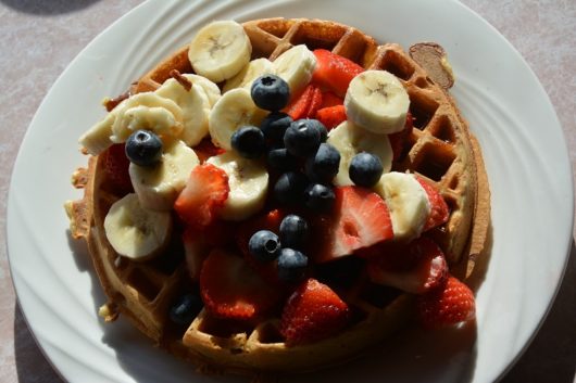 Waffles with berries and bananas