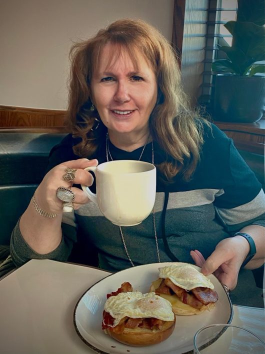 Linda with java and egg sandwich