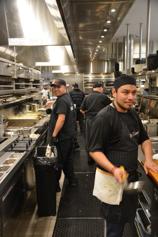 kitchen staff in kitchen at Topps Diner