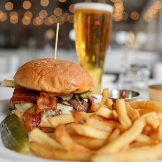 Burger with fries and beer