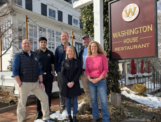 Owners and management at Washington House