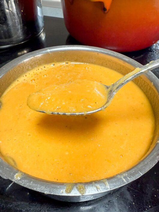 spoonful of yellow tomato sauce