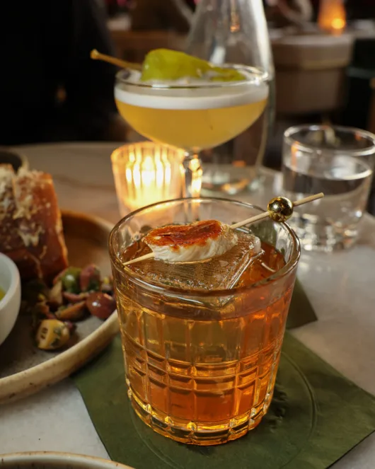 Banana Rama cocktail with rye aged rum, banana, and black walnut at Olea