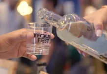 Tequila being poured into a tasting glass at NYC Tequila and Spirits Fest in Jersey City