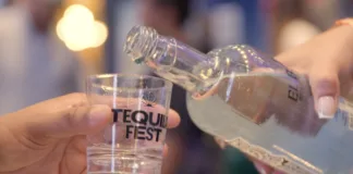 Tequila being poured into a tasting glass at NYC Tequila and Spirits Fest in Jersey City