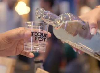 Tequila being poured into a tasting glass at NYC Tequila and Spirits Fest in Jersey City