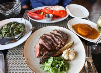 Dry-aged steak dinner spread at Drifthouse in Sea Bright, NJ