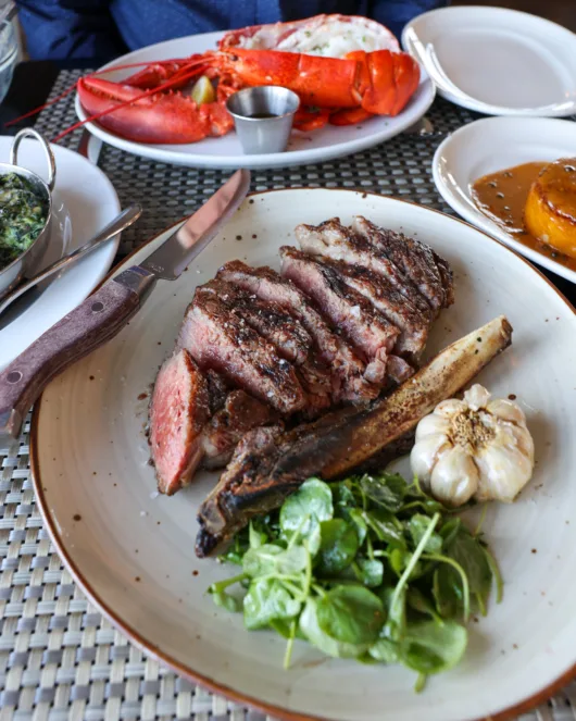 Surf and turf dinner with dry-aged steak, lobster, sushi and cocktails at Drifthouse in Sea Bright, NJ