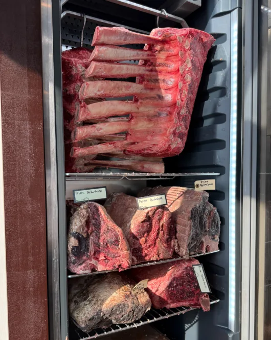 Dry-aged beef display fridge at Drifthouse in Sea Bright, NJ