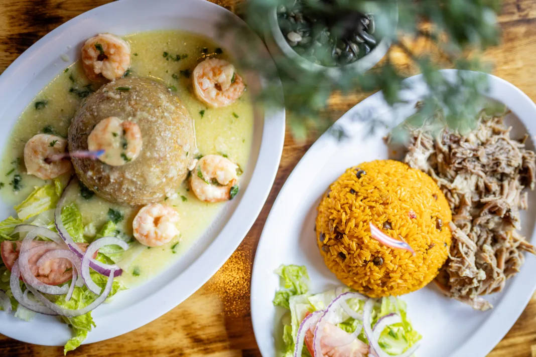 Traditional Puerto Rican mofongo topped with garlic shrimp at Taino's Kitchen in Newark, New Jersey