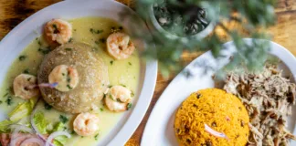 Traditional Puerto Rican mofongo topped with garlic shrimp at Taino's Kitchen in Newark, New Jersey