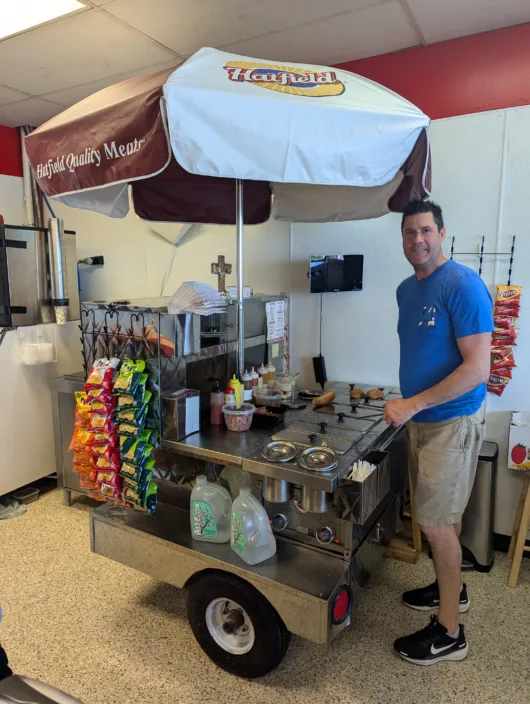 Lou Dogs' Original Umbrella Cart The original umbrella hot dog cart used by Lou Dogs in Sea Isle City since 1982.