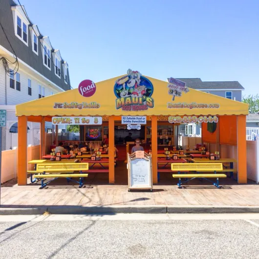 Maui's Dog House Exterior in Wildwood The colorful exterior of Maui's Dog House in Wildwood, New Jersey, decorated with bright tropical-themed artwork.
