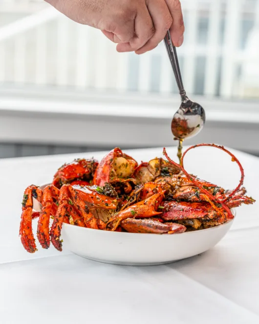 Rooney's signature Angry Lobster served in spicy garlic butter at Rooney's Oceanfront Restaurant in Long Branch, NJ