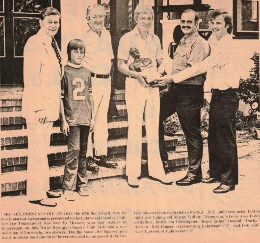 Bob Housen presenting the Ike Award to Lakewood Country Club in 1976. Bob is accompanied by his father, Ducky Housen, long-time club champion, his son, and Lakewood Mayor Wilbur Thomson. Trophy received by Robert and Raef on behalf of the Club.