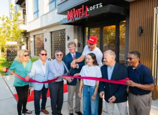 New Restaurant Openings August 2026: Farm-fresh Italian, Pastries, French Cuisine, and more! Group of people pose outside The Inkwell Lofts during a ribbon-cutting ceremony celebrating the opening of the venue.