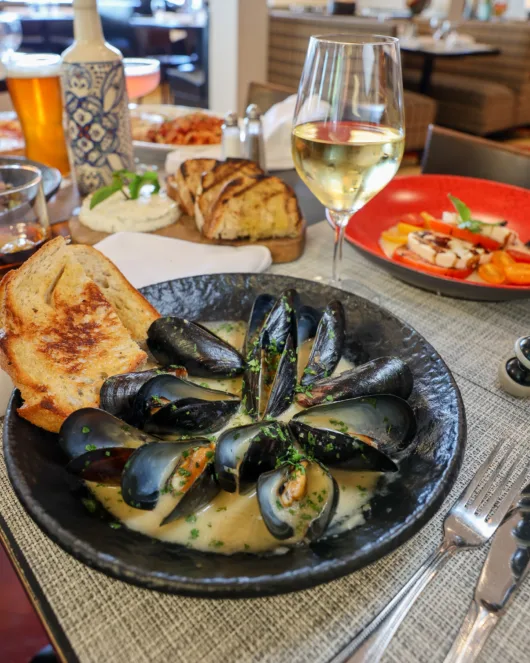 Steamed mussels in white wine and garlic with grilled bread at Beneci’s D’Italia Cucina in Weehawken, NJ