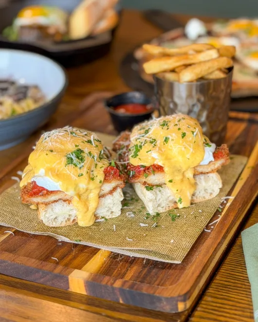 Chicken Parm Benedict topped with Pecorino hollandaise from the brunch menu at Paragon American + Italian Gastropub in Clark, NJ.