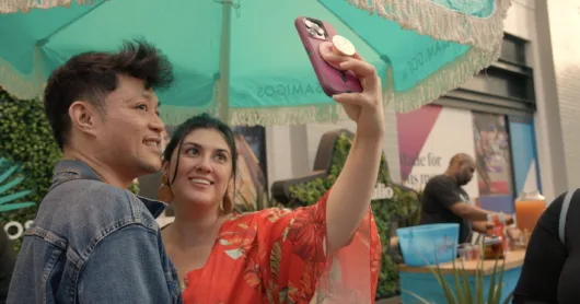 Two guests taking a selfie while enjoying the Jersey City Cocktail Festival.