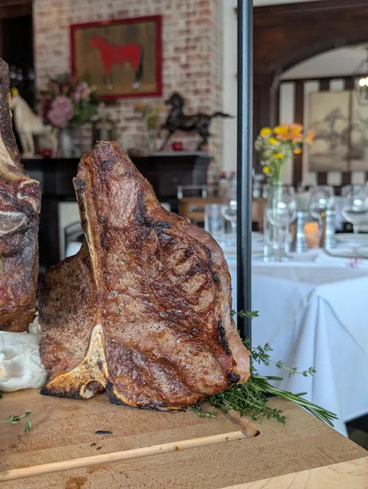Large cut of steak at Red Horse Steakhouse by David Burke