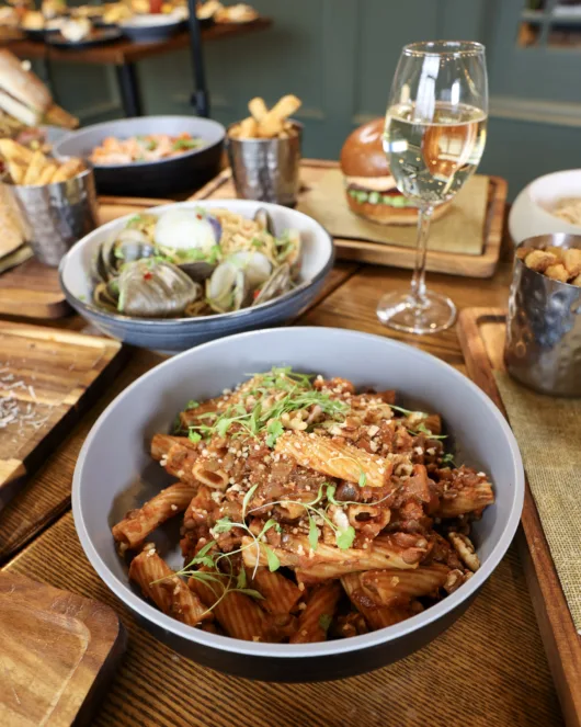 Vegan Bolognese at Paragon American + Italian Gastropub in Clark, NJ, part of a menu featuring creative vegan and gluten-free options.