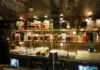 Back bar at House of Amrut in Jersey City displaying an extensive collection of Indian single malt whiskies.