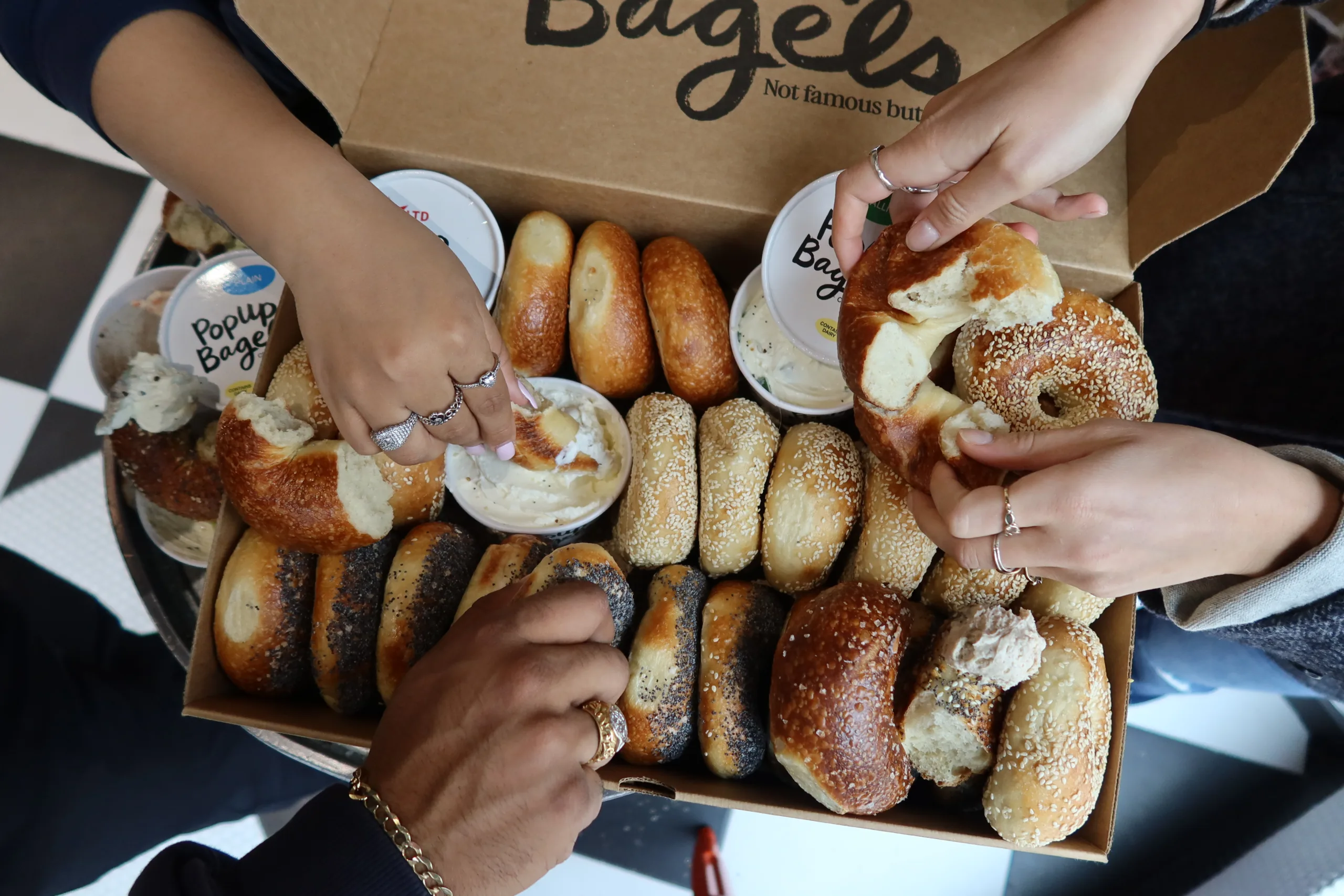 PopUp Bagels assortment of freshly baked bagels with assorted schmears, ready to tear and dip.